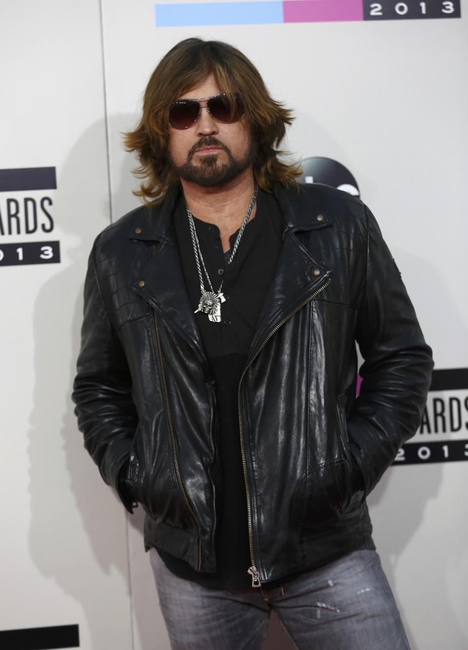 Singer Billy Ray Cyrus arrives at the 41st American Music Awards in Los Angeles, California November 24, 2013. REUTERS/Mario Anzuoni (UNITED STATES - Tags: ENTERTAINMENT) (AMA-ARRIVALS)