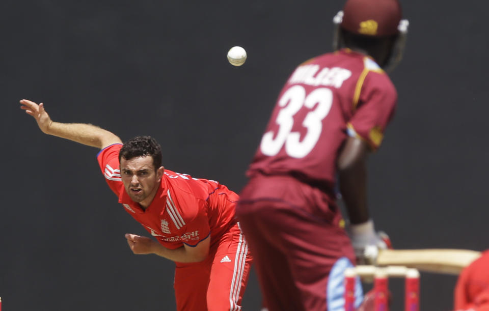 England's Stephen Parry bowls to West Indies' Nikita Miller during their second one-day international cricket match at the Sir Vivian Richards Cricket Ground in St. John's, Antigua, Sunday, March 2, 2014. (AP Photo/Ricardo Mazalan)