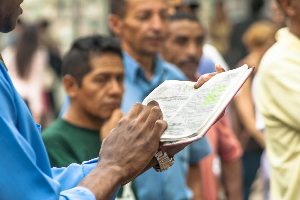 Sao Paulo, Brazil, January 09, 2009. Man evangelical preacher explains God's Word in Se Square in downtown Sao Paulo