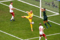 Soccer Football - World Cup - Group C - Denmark vs Australia - Samara Arena, Samara, Russia - June 21, 2018 Denmark's Kasper Schmeichel makes a save as Australia's Andrew Nabbout looks on REUTERS/David Gray