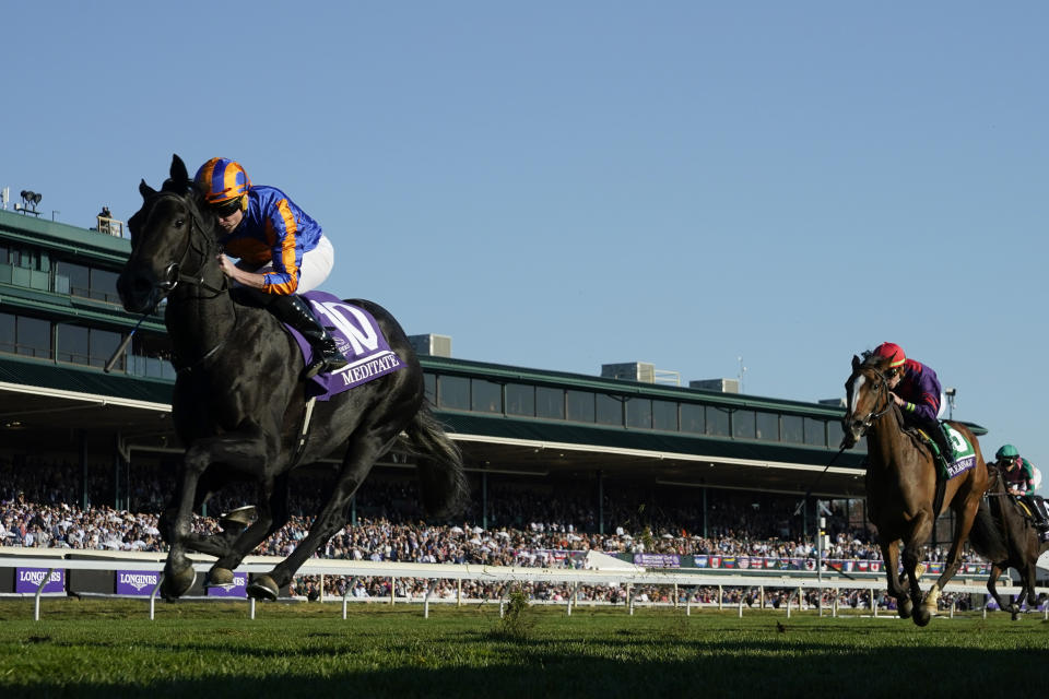 Tyler Gaffalione celebrates after riding Wonder Wheel to victory in the Breeders' Cup Juvenile Fillies race at the Keenelend Race Course, Friday, Nov. 4, 2022, in Lexington, Ky. (AP Photo/Jeff Roberson)