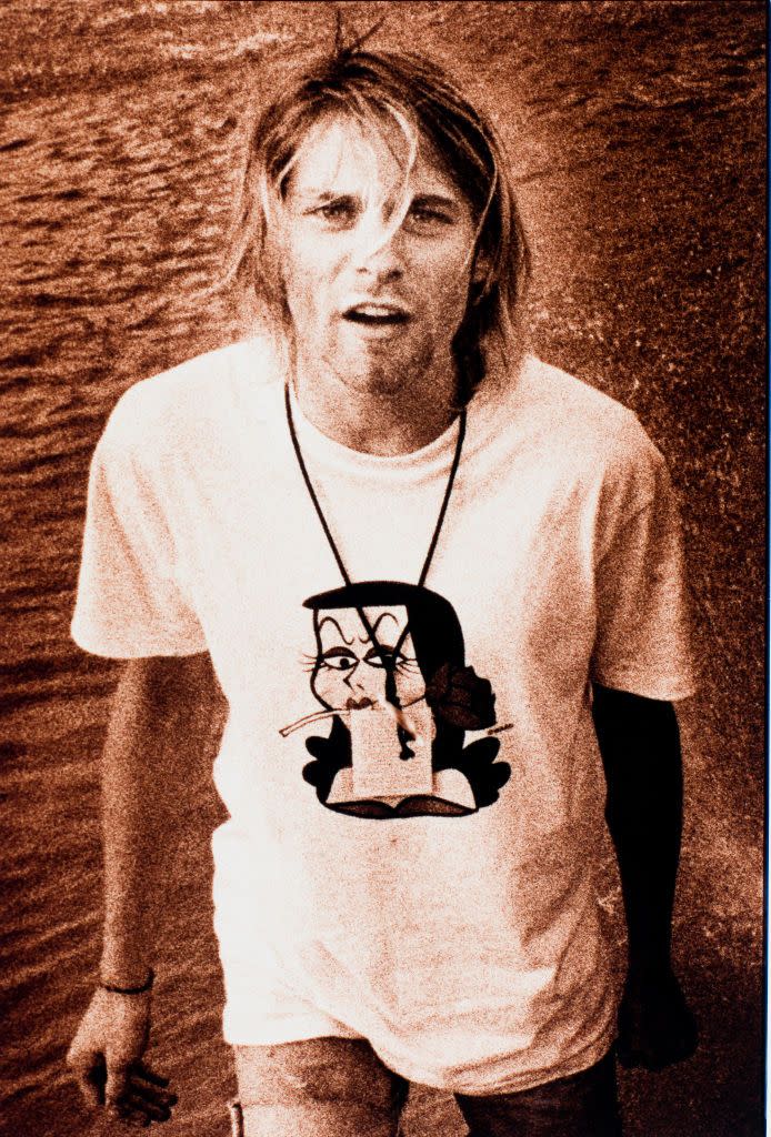 <p>Kurt Cobain on tour in 1991. The band's first album, <em>Bleach, </em>reportedly only <a href="https://ultimateclassicrock.com/nirvana-bleach/" rel="nofollow noopener" target="_blank" data-ylk="slk:cost $606.17 to make;elm:context_link;itc:0;sec:content-canvas" class="link ">cost $606.17 to make</a>. </p>