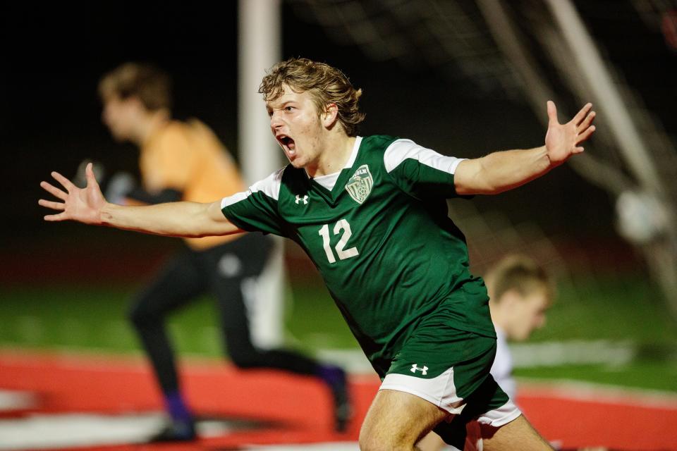 Lincoln's Sal Tozzi (12) celebrates his goal during the second half. The Lincoln Trojans defeated the Columbia Tigers 1-0 at Leon High School on Wednesday, Jan. 26, 2022.