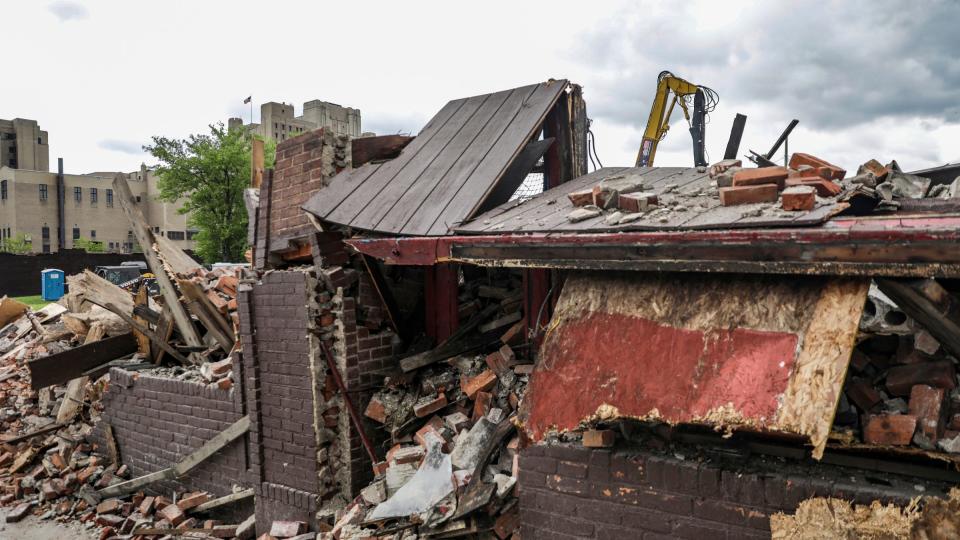 The building at 3143 Cass avenue has asbestos and is demolished in midtown Detroit on Saturday, July 29, 2023. 