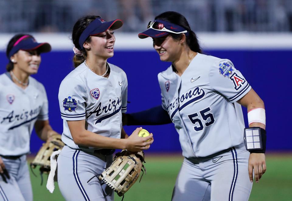 Arizona outfielder Jasmine Perezchica celebrates with Giulia Koutsoyanopulos (55) after making a catch for the final out against Oregon State on Friday night.