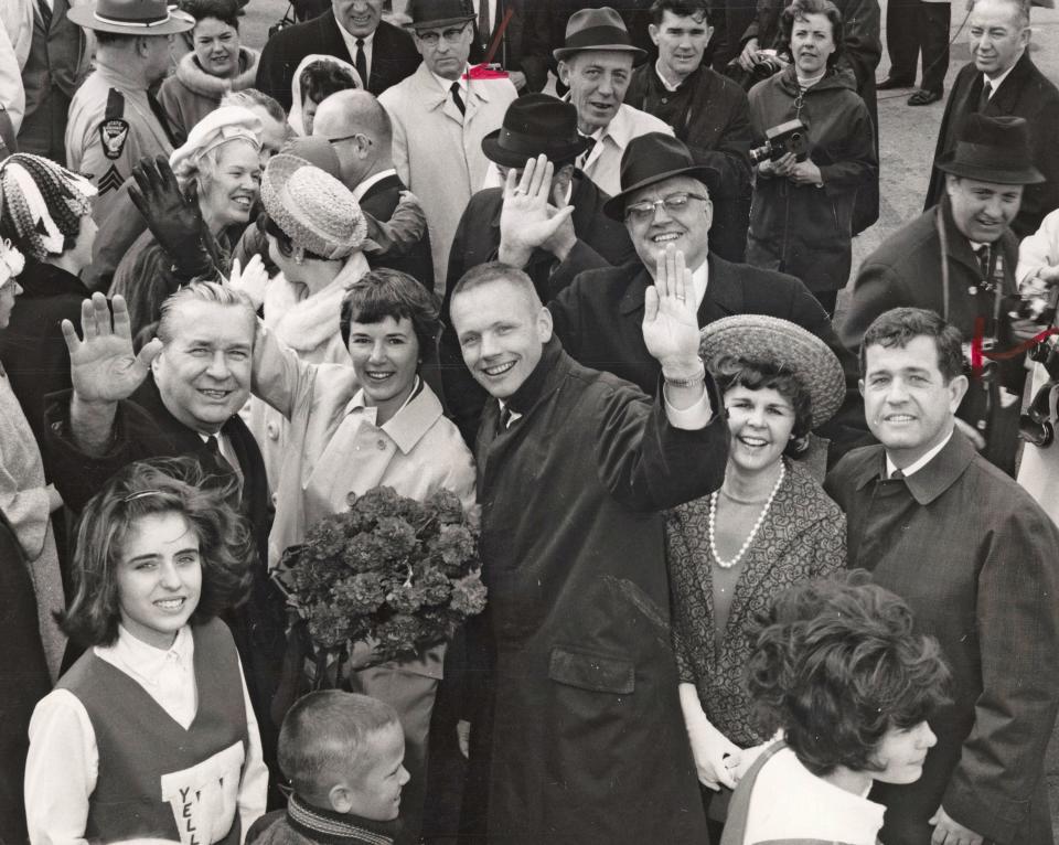 Neil Armstrong, center, with his wife, Janet, holding flowers on Sept. 6, 1969, at his Wapakoneta homecoming after the successful Apollo 11 moon landing. To Janet Armstrong's left is Ohio Gov. James Rhodes, for whom the Rhodes State Office Tower in downtown Columbus was named.