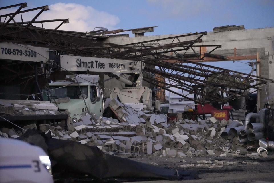 Damage is seen to the Sinnott Tree Service building in McCook, Ill., Wednesday, July 12, 2023. A tornado touched down Wednesday evening near Chicago’s O’Hare International Airport, prompting passengers to take shelter and disrupting hundreds of flights. There were no immediate reports of injuries. (AP Photo/Nam Y. Huh)