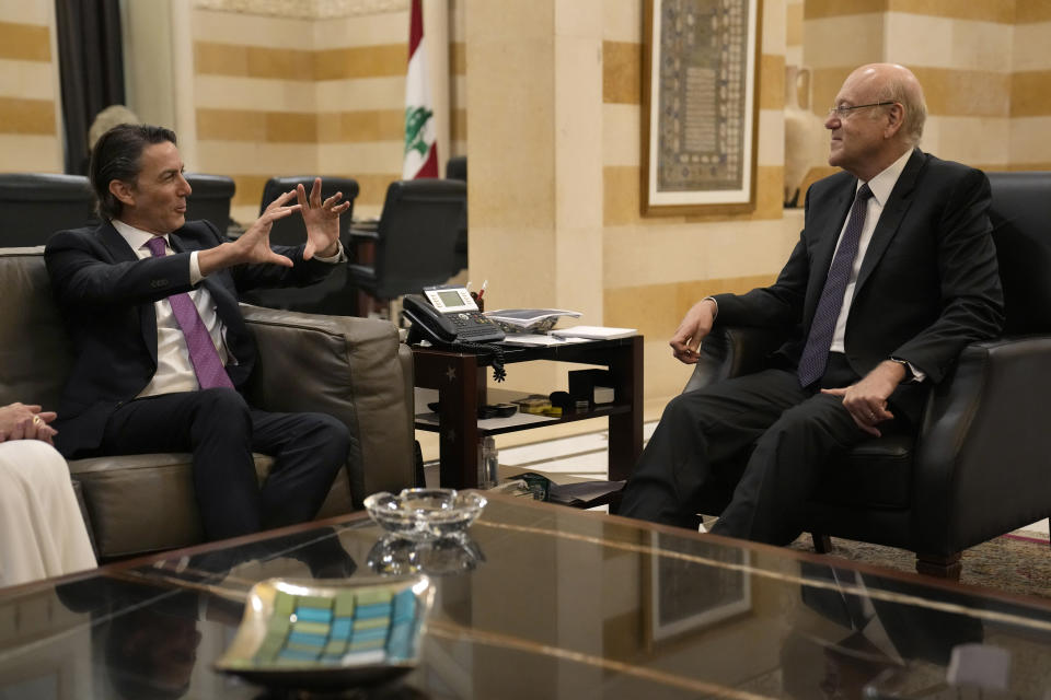 Senior Advisor to U.S. President Biden Amos Hochstein, left, gestures as he meets with Lebanese caretaker Prime Minister Najib Mikati, in Beirut, Lebanon, Wednesday, Aug. 30, 2023. Hochstein arrived in Lebanon on an official visit following nearly a year after he mediated a maritime border deal between Lebanon and Israel that paved the way for gas-exploration in the crisis-hit country. (AP Photo/Hussein Malla)