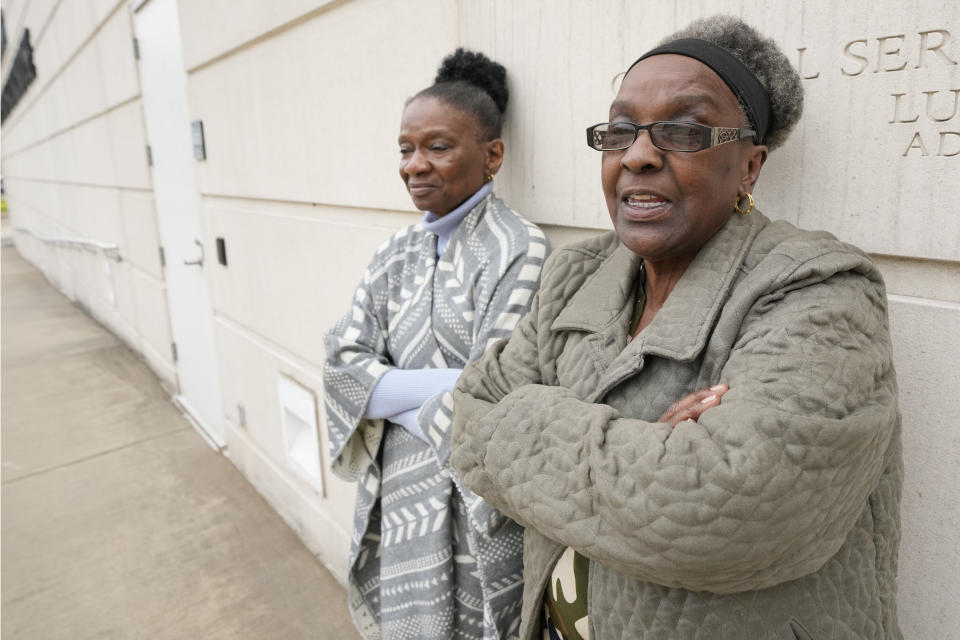 Linda Rawls, right, aunt of Eddie Terrell Parker, and Mary Jenkins, mother of Michael Corey Jenkins, express their relief and approval of the prison terms from about 10 to 40 years for six white former Mississippi law enforcement officers who pleaded guilty to breaking into a home without a warrant and torturing Jenkins and Parker, Thursday, March 21, 2024, at the federal courthouse in Jackson, Miss. (AP Photo/Rogelio V. Solis)