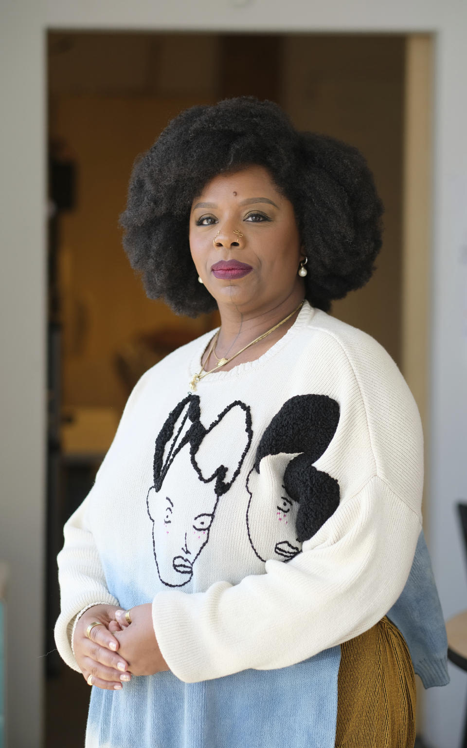 Artist Patrisse Cullors poses for a portrait at her studio, Friday, March 24, 2023, in Los Angeles. (AP Photo/Chris Pizzello)