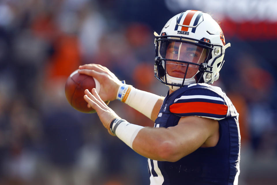 Auburn quarterback Bo Nix (10) warms up before the first half of an NCAA college football game against Kent State, Saturday, Sept. 14, 2019, in Auburn, Ala. (AP Photo/Butch Dill)