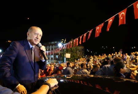 Turkish President Tayyip Erdogan addresses his supporters in Rize, Turkey August 10, 2018. Cem Oksuz/Presidential Palace/Handout via REUTERS