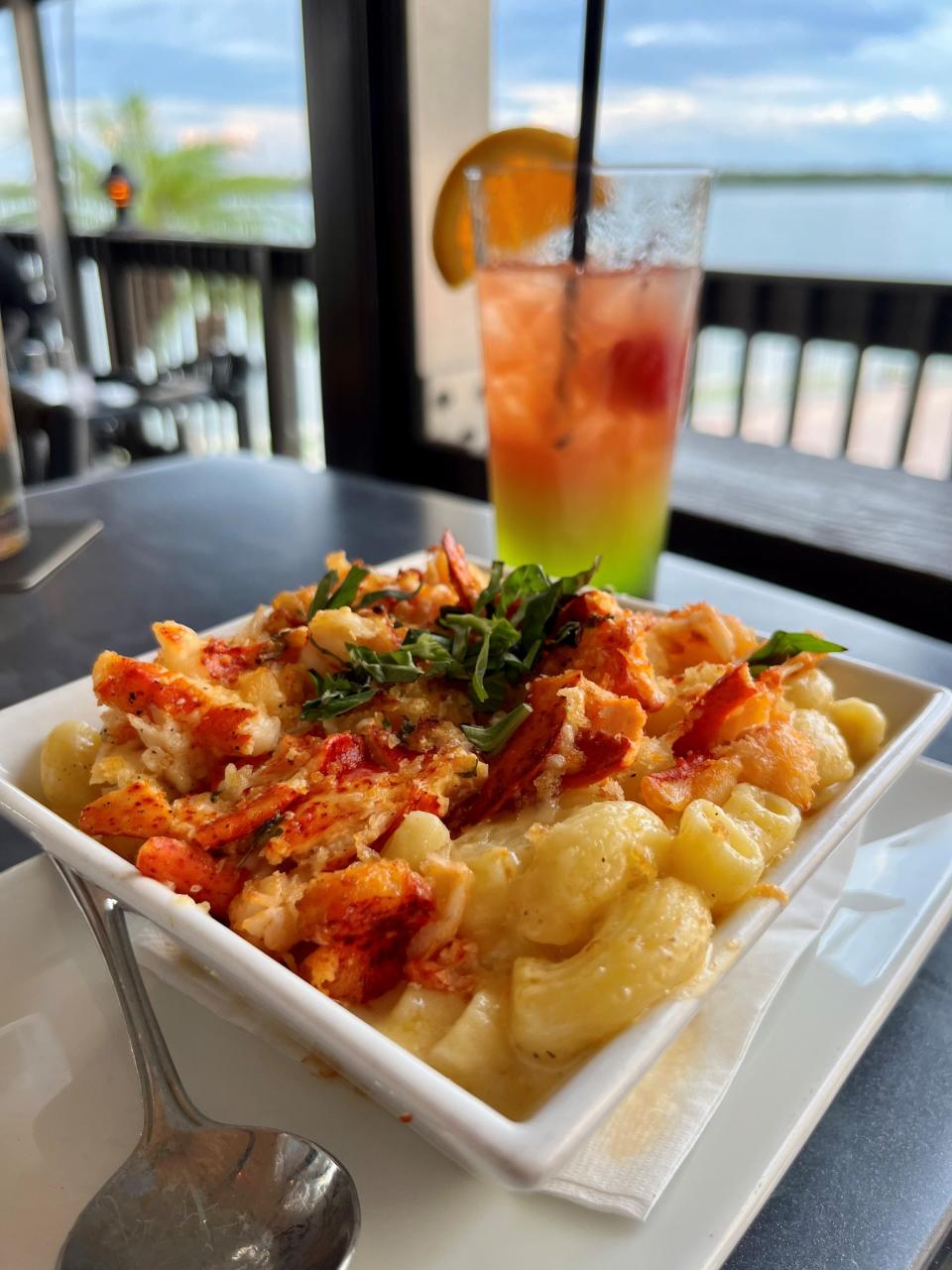 Gourmet lobster mac is served overlooking Estero Bay at Flipper's On The Bay on Fort Myers Beach.