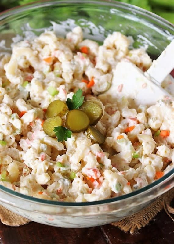 <p>The Kitchen is my Playground</p><p>Bring back the retro days of Kentucky Fried Chicken with this copycat KFC Macaroni Salad recipe.</p><p><strong>Get the recipe: </strong><a href="https://www.thekitchenismyplayground.com/2021/05/copycat-kfc-macaroni-salad.html/" rel="nofollow noopener" target="_blank" data-ylk="slk:Copycat KFC Macaroni Salad;elm:context_link;itc:0;sec:content-canvas" class="link "><strong>Copycat KFC Macaroni Salad</strong></a></p>