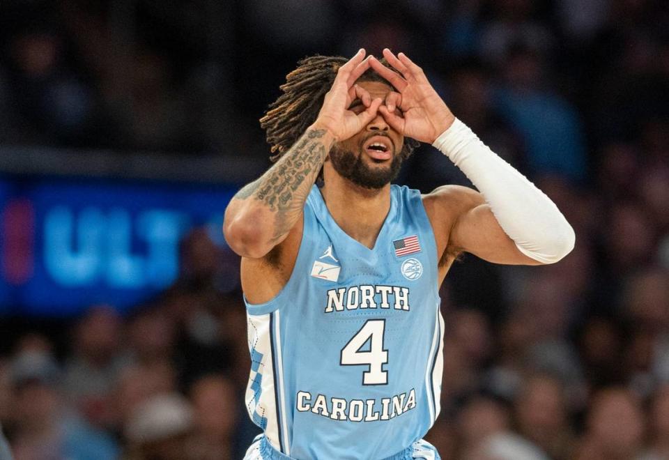 North Carolina’s R.J. Davis (4) reacts after sinking a three-point basket against Connecticut during the first half in the Jimmy V Classic on Tuesday, December 5, 2023 at Madison Square Garden in New York, NY.