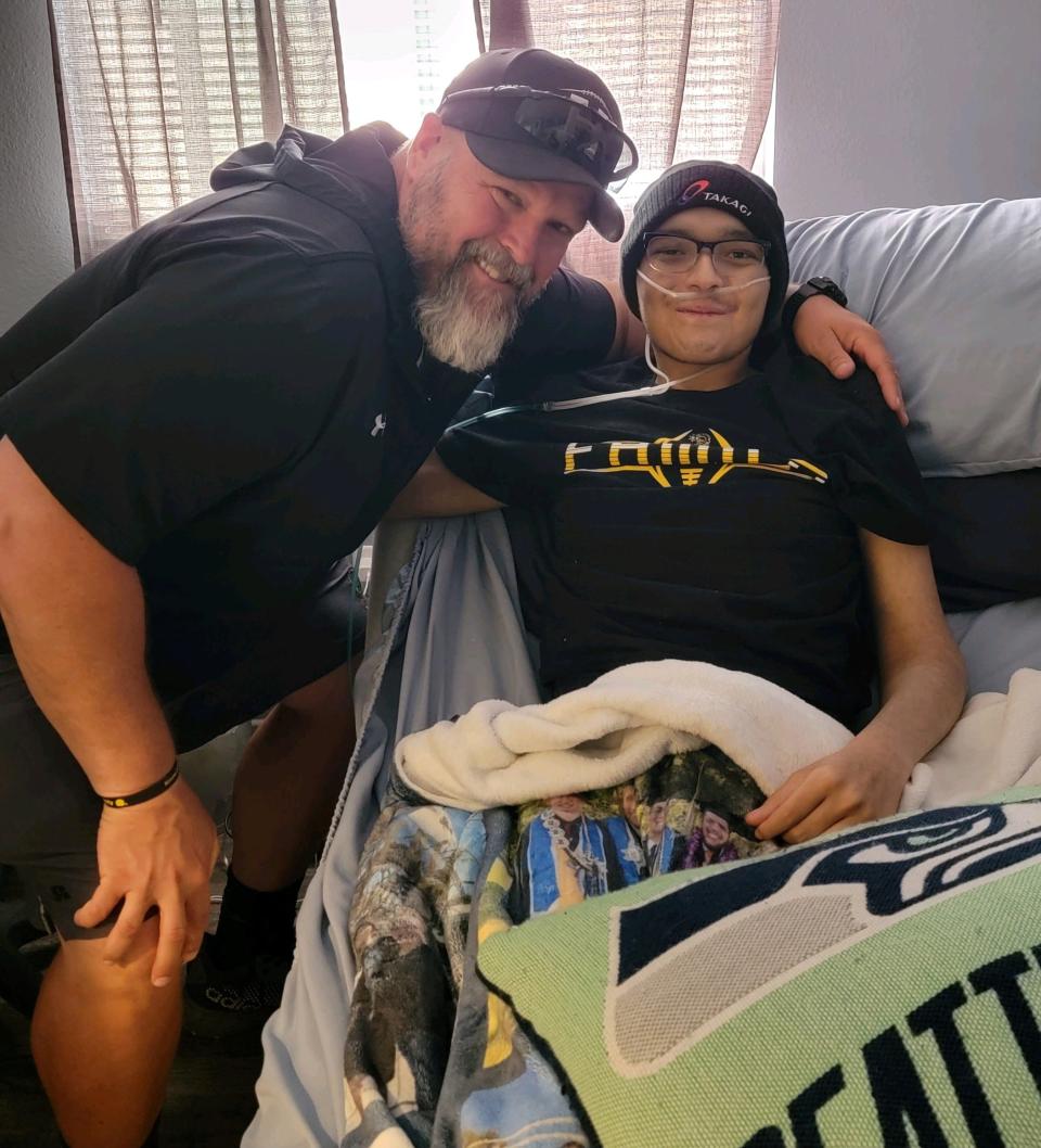 Adan Munoz and Hesperia football coach Casey Goodnough pose for a photo. Munoz passed away on April 15, 2023 after battling acute myeloid leukemia, a cancer of the bone marrow and blood.