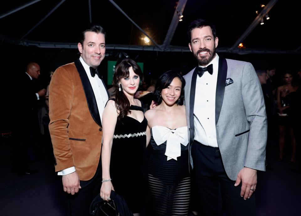 WEST HOLLYWOOD, CALIFORNIA - NOVEMBER 11: (L-R) Jonathan Scott, Zooey Deschanel, Linda Phan, and Drew Scott attend 2023 Baby2Baby Gala Presented By Paul Mitchell at Pacific Design Center on November 11, 2023 in West Hollywood, California. (Photo by Stefanie Keenan/Getty Images for Baby2Baby)