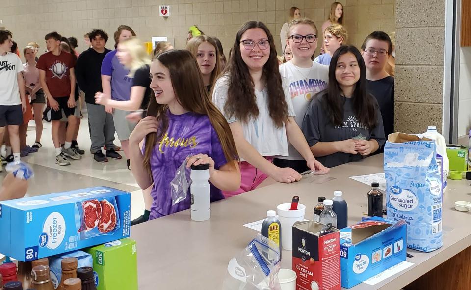 Students line up for the ice cream making activity during the Watertown Middle School Arrowfest on Friday, May 26, 2023.