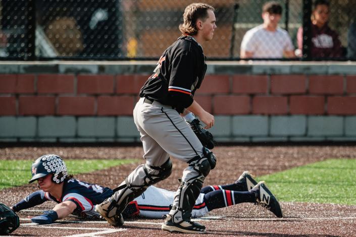 Indian Valley&#39;s Gavin Henry slides safely into home during the game against Ridgewood Thursday.