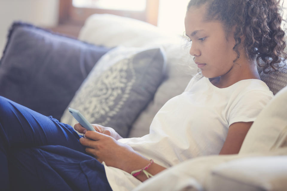 Kids and teens may refer to cyberbullying as "drama," "gossip" or trolling. (Photo: courtneyk via Getty Images)