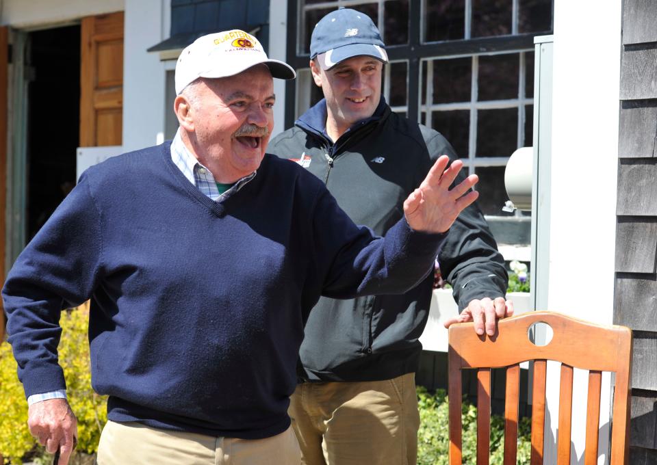 Tommy Leonard waves to the crowd before the dedication of the Falmouth Road Race starting line in 2012.