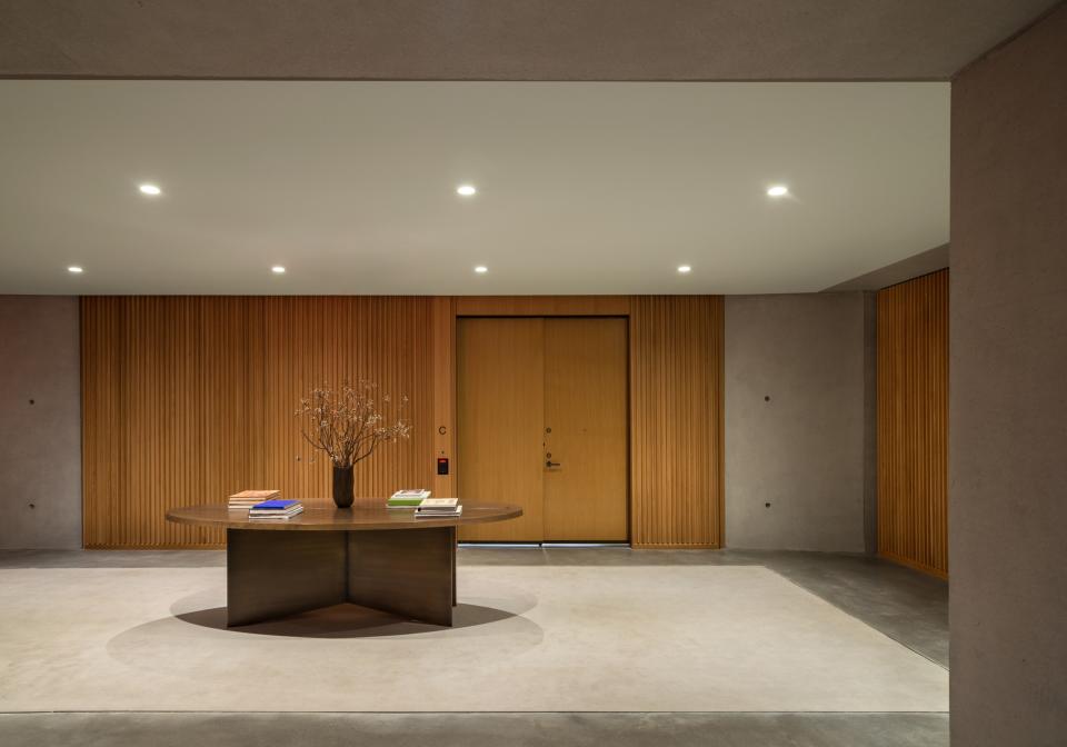 The building's 15 lofts are accessible through shared foyers, whose decor, emphasizing materiality in concrete and warm wood, sets the tone for the apartments. When looking for a craftsman to create the concrete walls and floors, Rosen immediately thought of Tadao Ando, arguably the master of the medium. Luckily, the well-connected Rosen considers the Japanese architect a friend. "I called up Tadao and asked him, 'How do you get your concrete so smooth?'" the developer recalls. "He told me about these guys, and they flew in a team. They all came in hazmat suits and were so efficient."