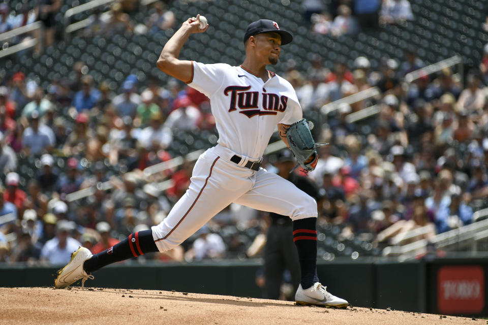 Minnesota Twins pitcher Chris Archer throws against the Chicago White Sox during the first inning of a baseball game, Sunday, July 17, 2022, in Minneapolis. (AP Photo/Craig Lassig)