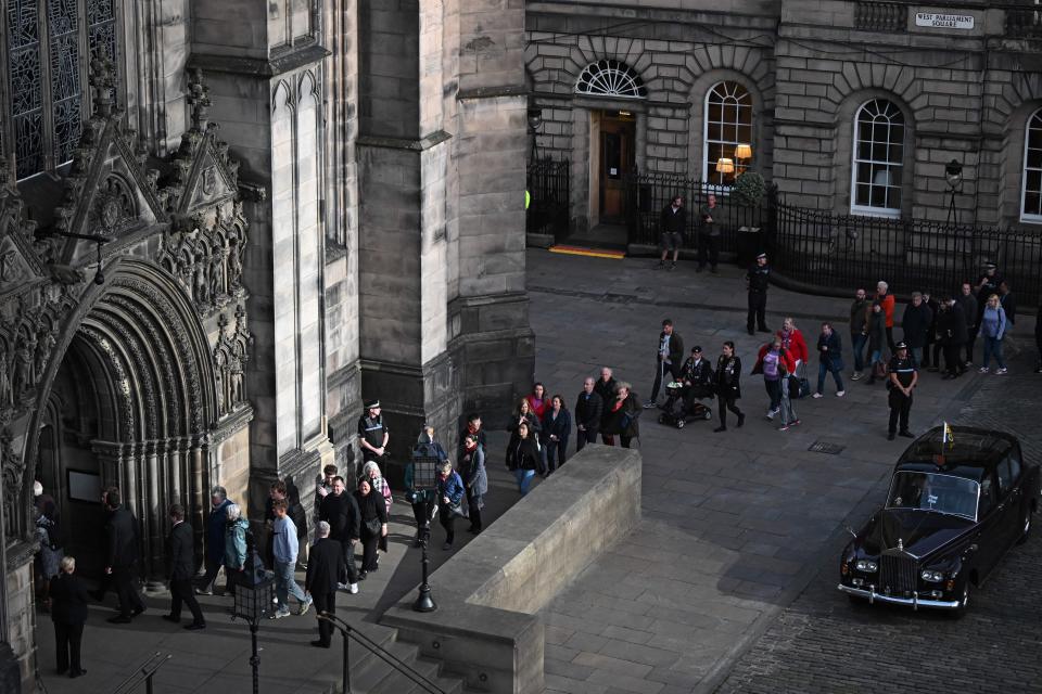 Members of the public wait to enter St Giles' Cathedral to pay their respects to the late Queen Elizabeth II on September 12, 2022.