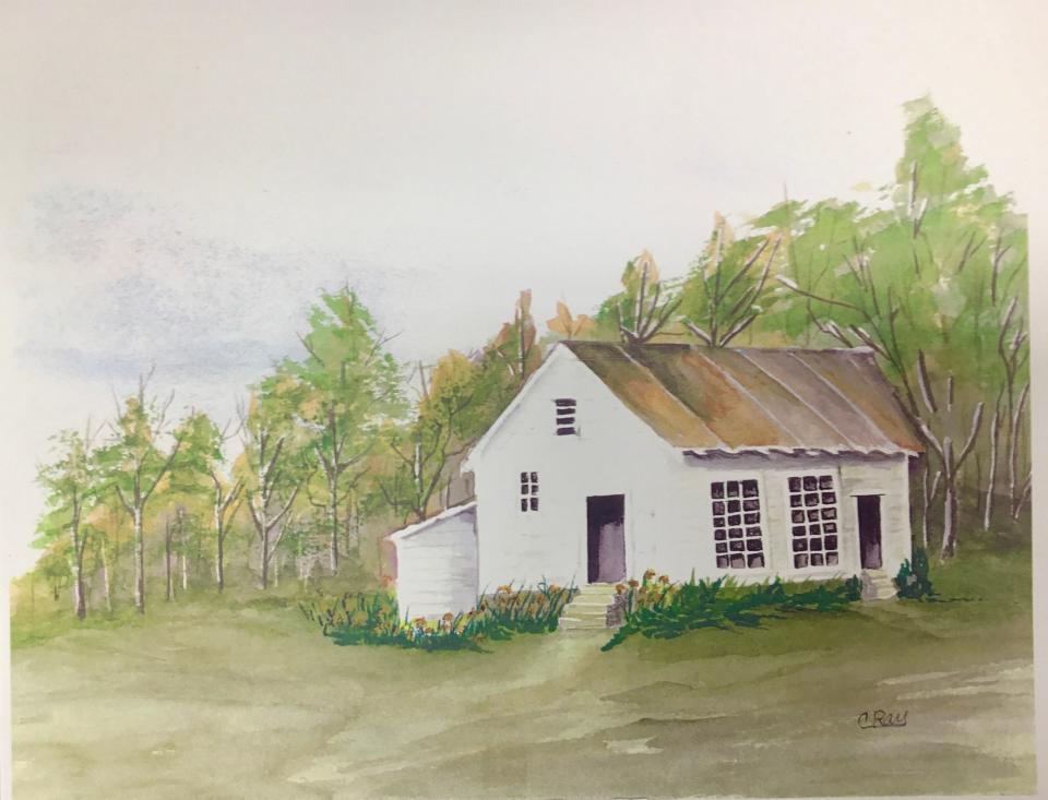 Willa Wyatt, Friends of the Mars Hill Anderson Rosenwald committee chair, presented the board of education with this painting of the school building by Charity Ray, an alumni of the school.