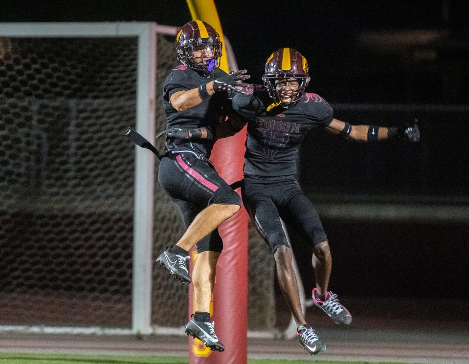 Edison's Bryan Anaya, left, celebrates with teammate Anthony Billberry who scored a touchdown during Sac-Joaquin Section first round playoff game against Gregori at Edison's Magnasco Stadium in Stockton on Nov. 3, 2023.