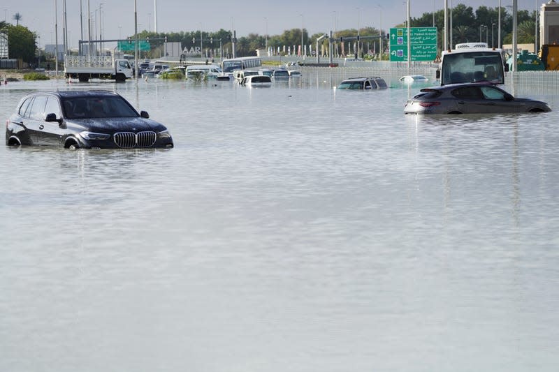 Vehicles sit abandoned in floodwater covering a major road in Dubai, United Arab Emirates, Wednesday, April 17, 2024. - Photo: Jon Gambrell (AP)