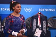 <p>USA's Simone Biles is seen during the artistic gymnastic women's qualification during the Tokyo 2020 Olympic Games at the Ariake Gymnastics Centre in Tokyo on July 25, 2021. (Photo by Martin BUREAU / AFP) (Photo by MARTIN BUREAU/AFP via Getty Images)</p> 