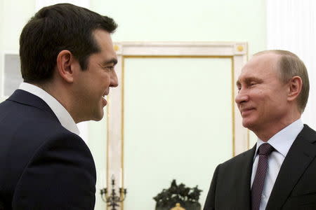 Russian President Vladimir Putin (R) meets with Greek Prime Minister Alexis Tsipras at the Kremlin in Moscow, April 8, 2015. REUTERS/Alexander Zemlianichenko/Pool