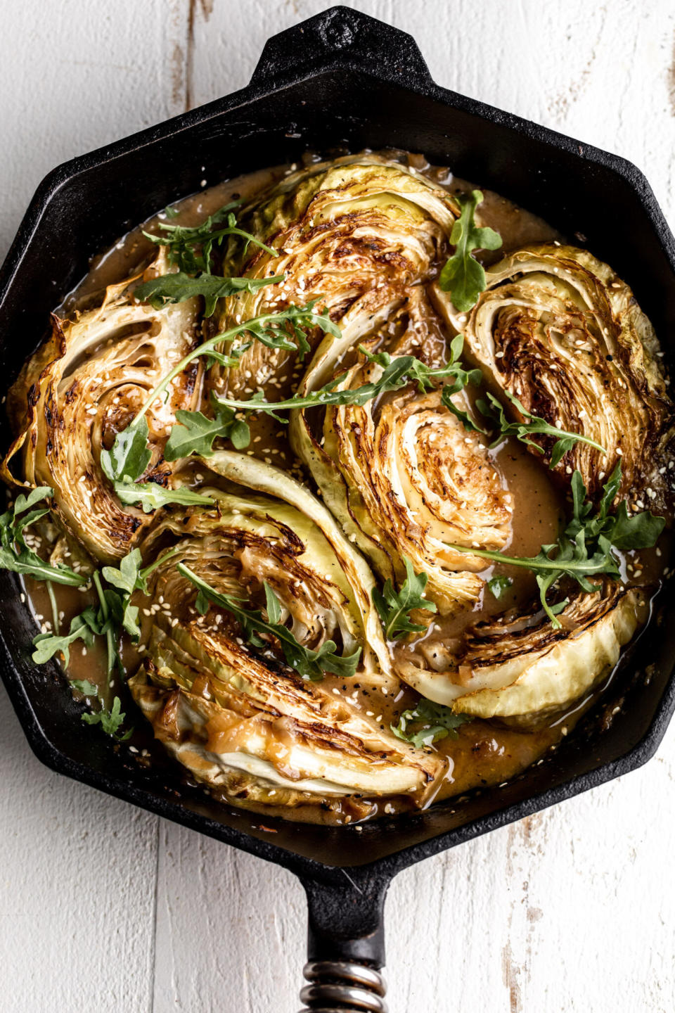 A skillet of Miso Braised Cabbage.