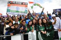 India celebrate Sharma's 100 (Photo by OLI SCARFF/AFP/Getty Images)