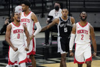 Houston Rockets guard Sterling Brown (0) and forward David Nwaba (2) celebrate their win over the San Antonio Spurs in an NBA basketball game in San Antonio, Thursday, Jan. 14, 2021. (AP Photo/Eric Gay)