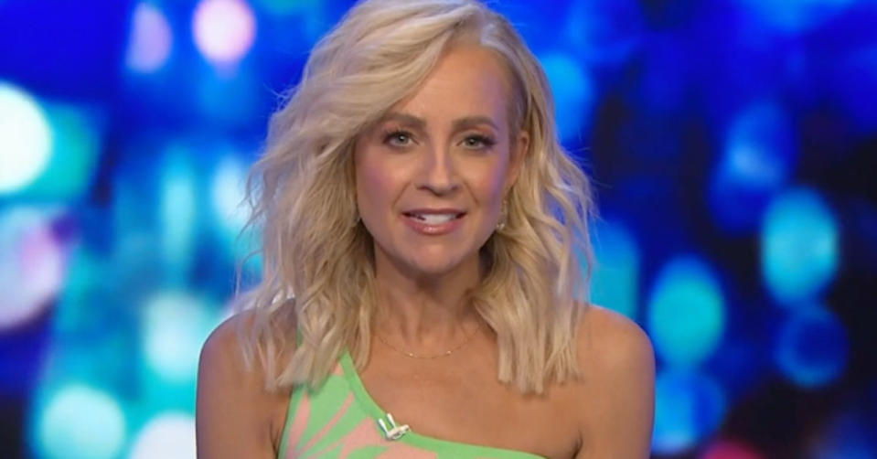 Carrie Bickmore on The Project in a one shoulder green and pink top