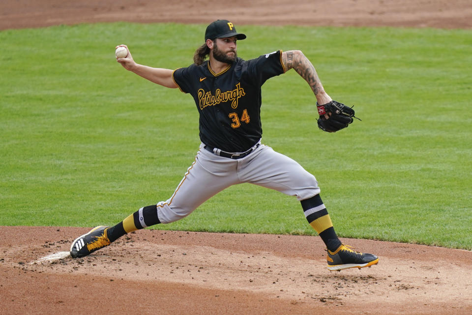 Pittsburgh Pirates starting pitcher Trevor Williams throws during the first inning of a baseball game against the Cincinnati Reds at Great American Ballpark in Cincinnati, Thursday, Aug. 13, 2020. (AP Photo/Bryan Woolston)