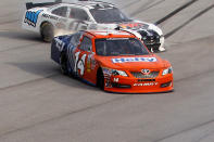 TALLADEGA, AL - MAY 05: Eric McClure, driver of the #14 Hefty/Reynolds Wrap Toyota, spins off the track during the NASCAR Nationwide Series Aaron's 312 at Talladega Superspeedway on May 5, 2012 in Talladega, Alabama. (Photo by Chris Graythen/Getty Images for NASCAR)