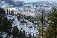 The mountain-perch town of Murree has long been a favourite for tourists who swarmed to see vistas dusted with fresh snowfall this week (AFP/Aamir QURESHI)