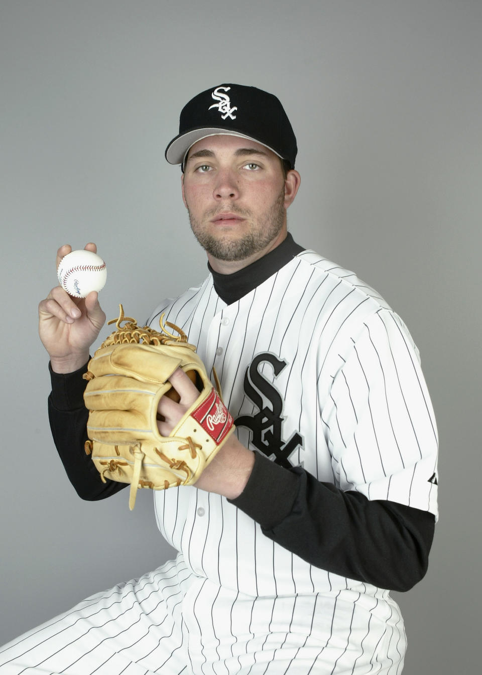 TUCSON, AZ – FEBRUARY 27: Pitcher Dan Wright #36 of the <a class="link " href="https://sports.yahoo.com/mlb/teams/chi-white-sox/" data-i13n="sec:content-canvas;subsec:anchor_text;elm:context_link" data-ylk="slk:Chicago White Sox;sec:content-canvas;subsec:anchor_text;elm:context_link;itc:0">Chicago White Sox</a> poses for a portrait during Media Day on February 27, 2004 at Tucson Electric Park in Tucson, Arizona. (Photo by Jeff Gross/Getty Images)