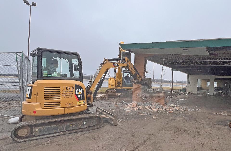 Demolition of the former Subway building at the Mansfield Lahm Airport continued on Thursday.