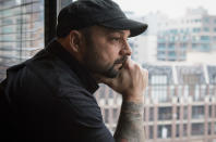 <p>Christian Picciolini, founder of the group Life After Hate, poses for a photograph in his Chicago home, Jan. 9, 2017. Picciolini, a former skinhead, is an activist combatting what many see as a surge in white nationalism across the United States. He’s doing it by helping members quit groups including the Ku Klux Klan and skinhead organizations. (Photo: Teresa Crawford/AP) </p>