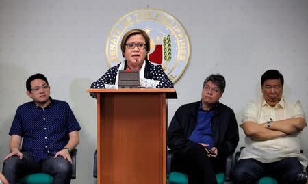 Philippine Senator Leila de Lima delivers a speech alongside fellow senators after a Regional Trial Court (RTC) ordered her arrest, at the Senate headquarters in Pasay city, metro Manila, Philippines February 23, 2017. REUTERS/Romeo Ranoco