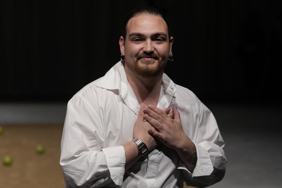 Designer Federico Cina gestures at the end of the Federico Cina men's Spring Summer 2024 fashion show presented in Milan, Italy, Saturday, June 17, 2023. (AP Photo/Luca Bruno)