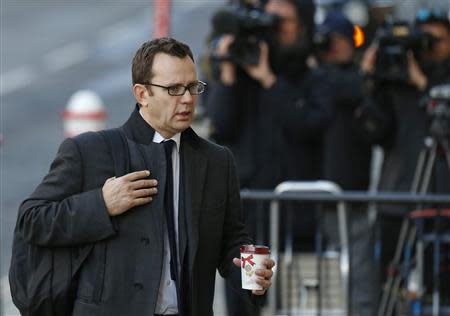 Former News of the World editor Andy Coulson arrives at the Old Bailey courthouse in London November 14, 2013. REUTERS/Olivia Harris