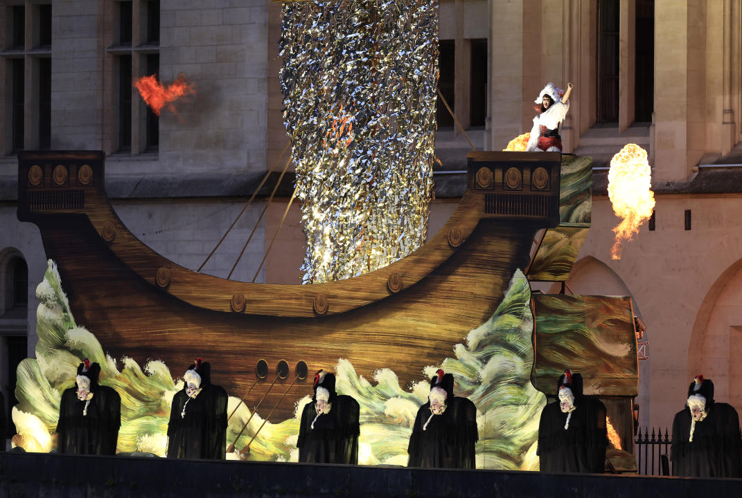 PARIS, FRANCE - JULY 26: Opera Singer Marina Viotti, the Orchestre de Paris and a Choir perform during the athletes’ parade on the River Seine near the Supreme Court during the opening ceremony of the Olympic Games Paris 2024 on July 26, 2024 in Paris, France. (Photo by Buda Mendes/Getty Images)