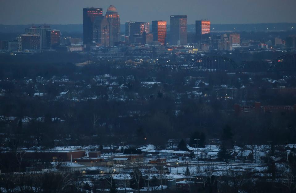The Louisville skyline at dusk during winter as seen from Floyd County, Indiana. January 7, 2022.