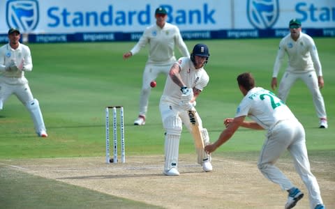 England's Ben Stokes (C) watches the ball after playing a shot delivered by South Africa's Dwaine Pretorius during the third day of the fourth Test cricket match between South Africa and England at the Wanderers Stadium in Johannesburg on January 26, 2020. - Credit: AFP