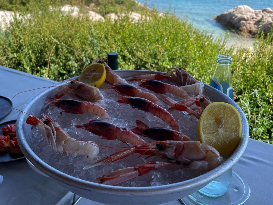 While meats and pasta has long been the traditional cuisine, fresh seafood is also on offer (The Independent)